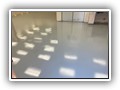 The customer did not want to see tile "ghosting" pattern left from the tile removal so they opted for an industrial HD gray epoxy. Two applications of low VOC gray epoxy.